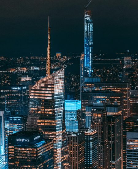 A captivating aerial view of New York City's glowing skyscrapers at night.